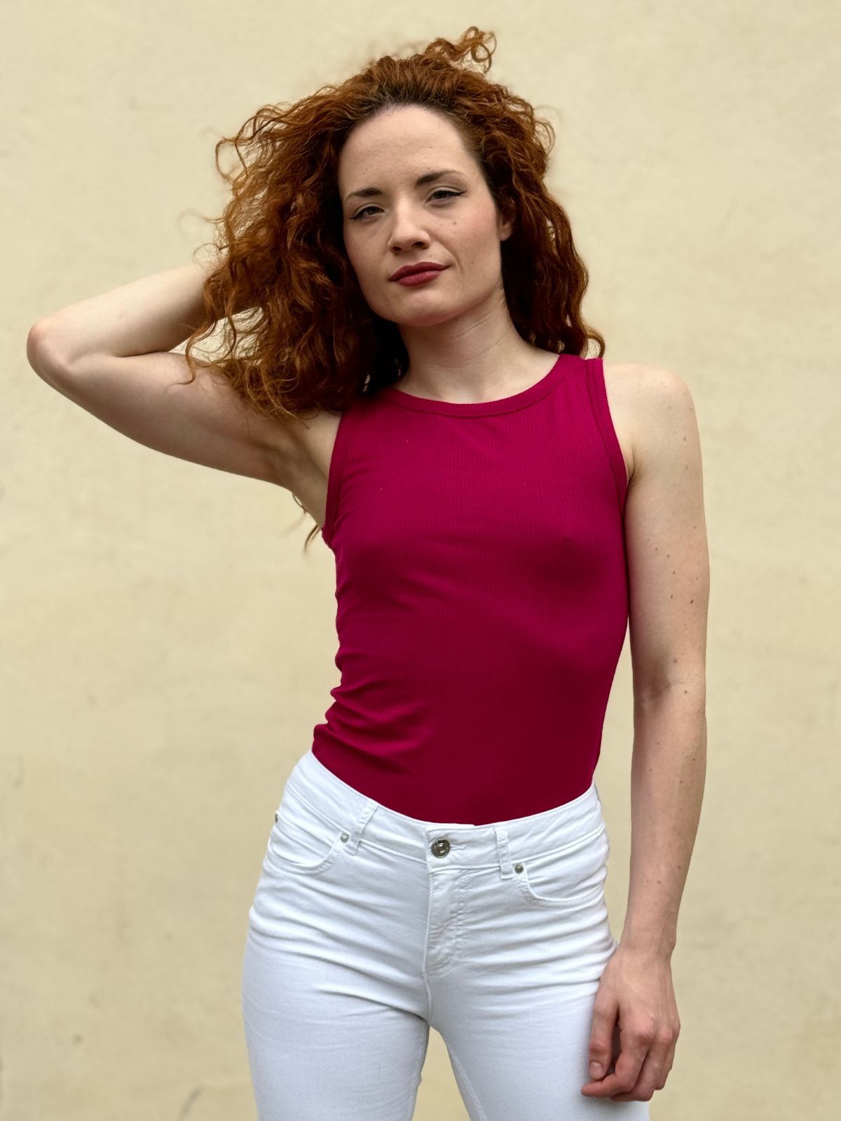 Top a costine taglio vogatore fucsia