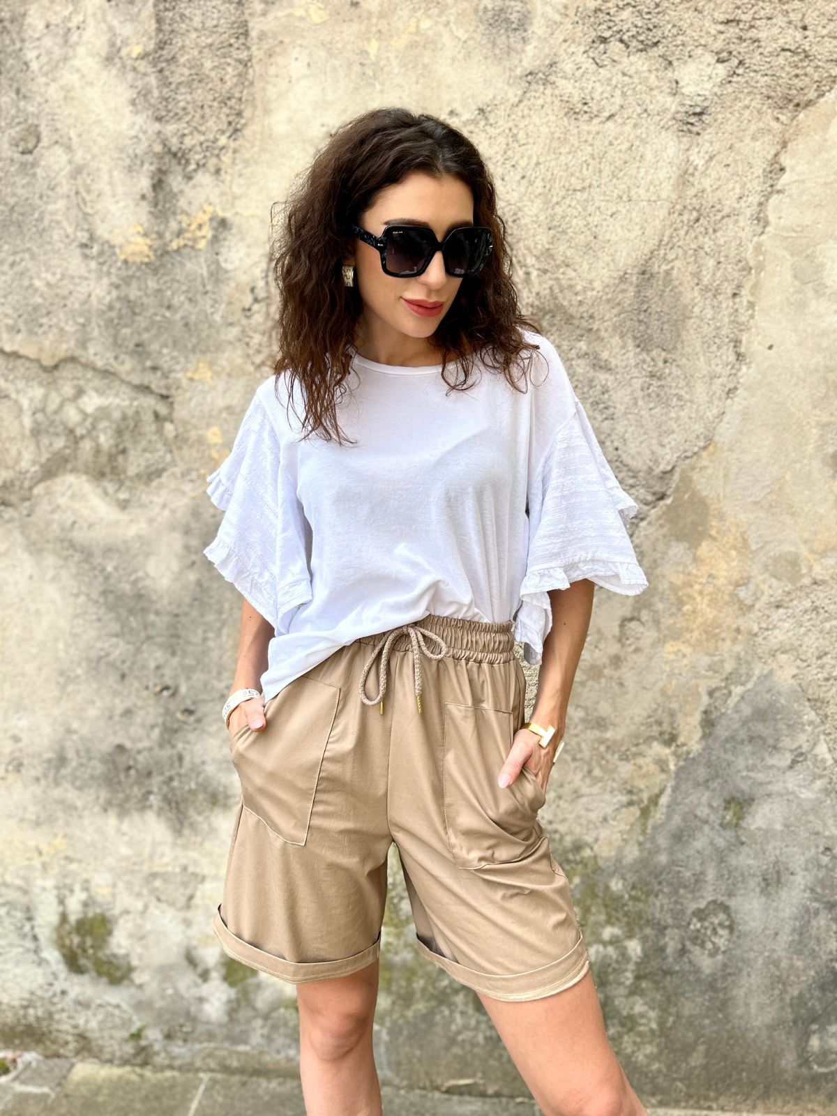 Pantalone in ecopelle modello bermuda fango