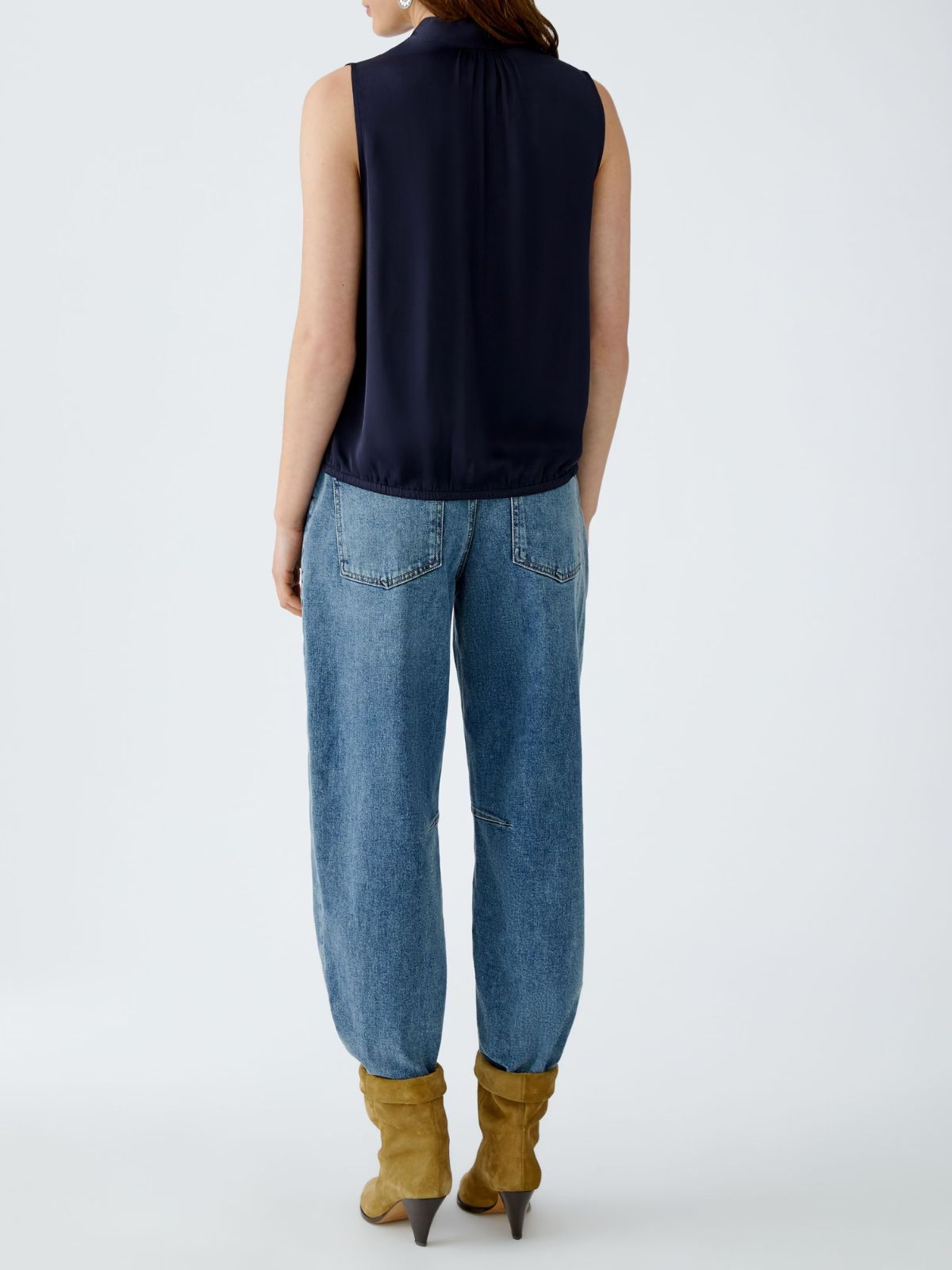 Blusa blu con scollo da annodare