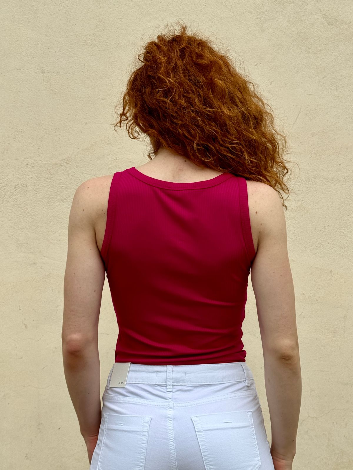 Top a costine taglio vogatore fucsia
