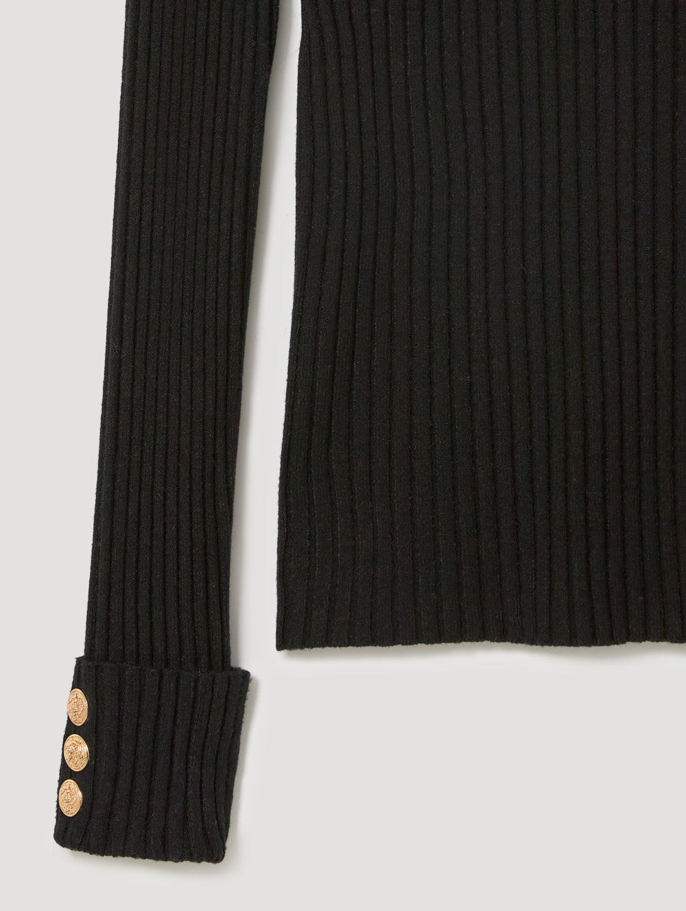 Maglia a coste collo alto