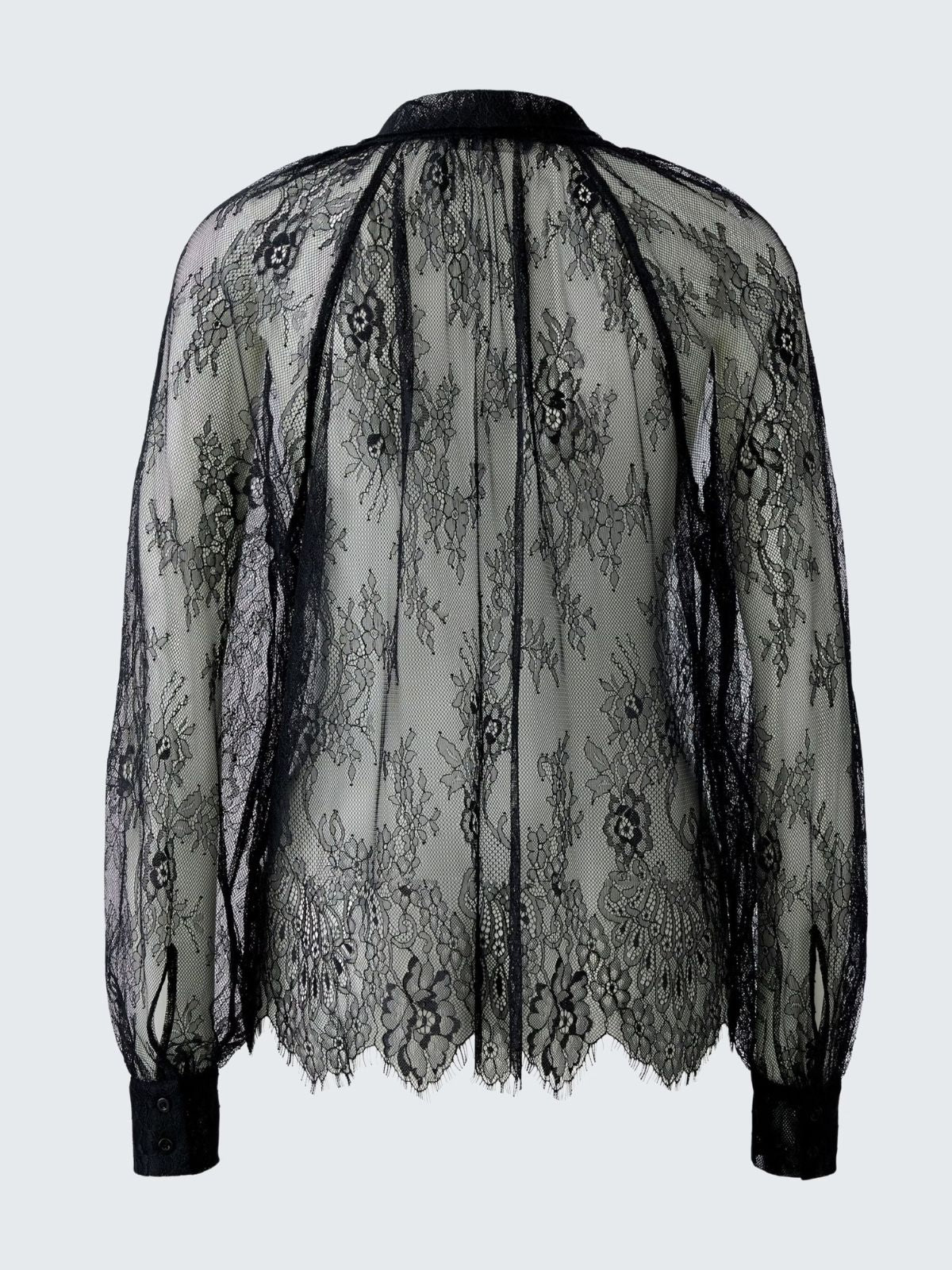 Blusa nera con fiocco